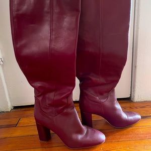 Knee high burgundy heeled boots